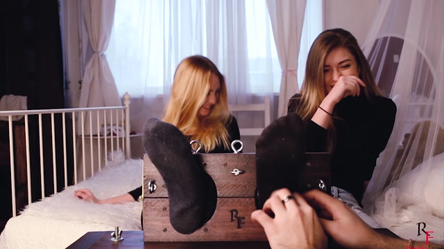 Ticling_in_Russia___Russian_Fetish_Production_presents_Russian_Fetish_-_Two_girls_in_one_stocks_and_brunette_vs_blonde.mp4.00000.jpg